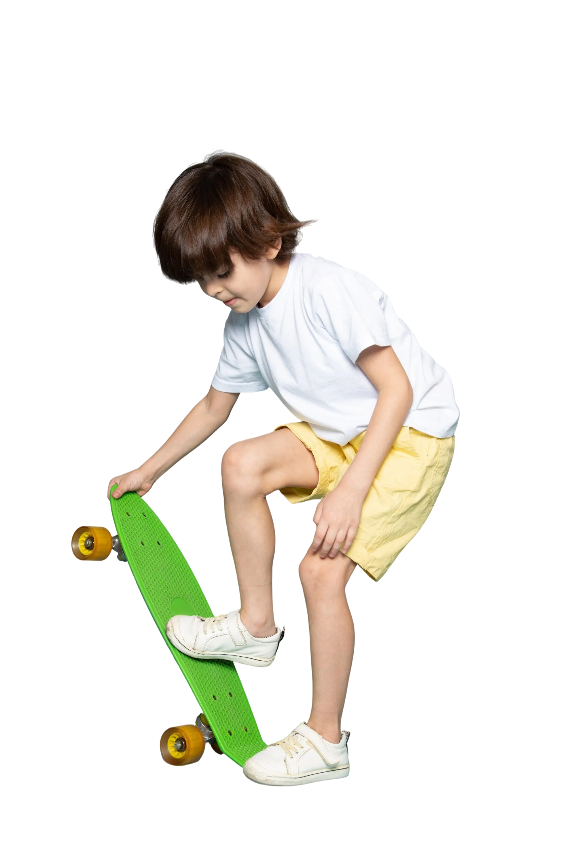 A boy on a skateboard, smiling